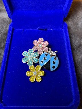 Blue Enamel Ladybug Brooch with Multicolor Crystal Flowers